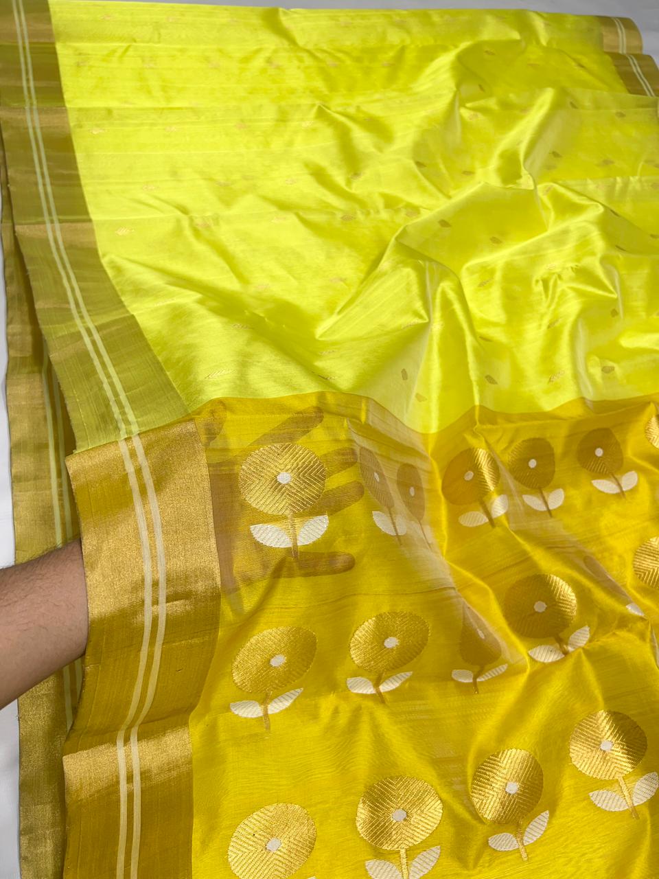 Elegant Lemon Yellow Chanderi Pattu soft silk saree featuring a rich gold zari border and a contrasting pallu with large hand-woven floral motifs.