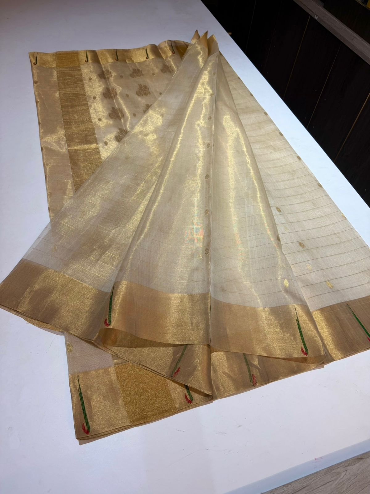 Champagne gold Katan silk blouse piece with a matching gold zari border and delicate green striped accents.