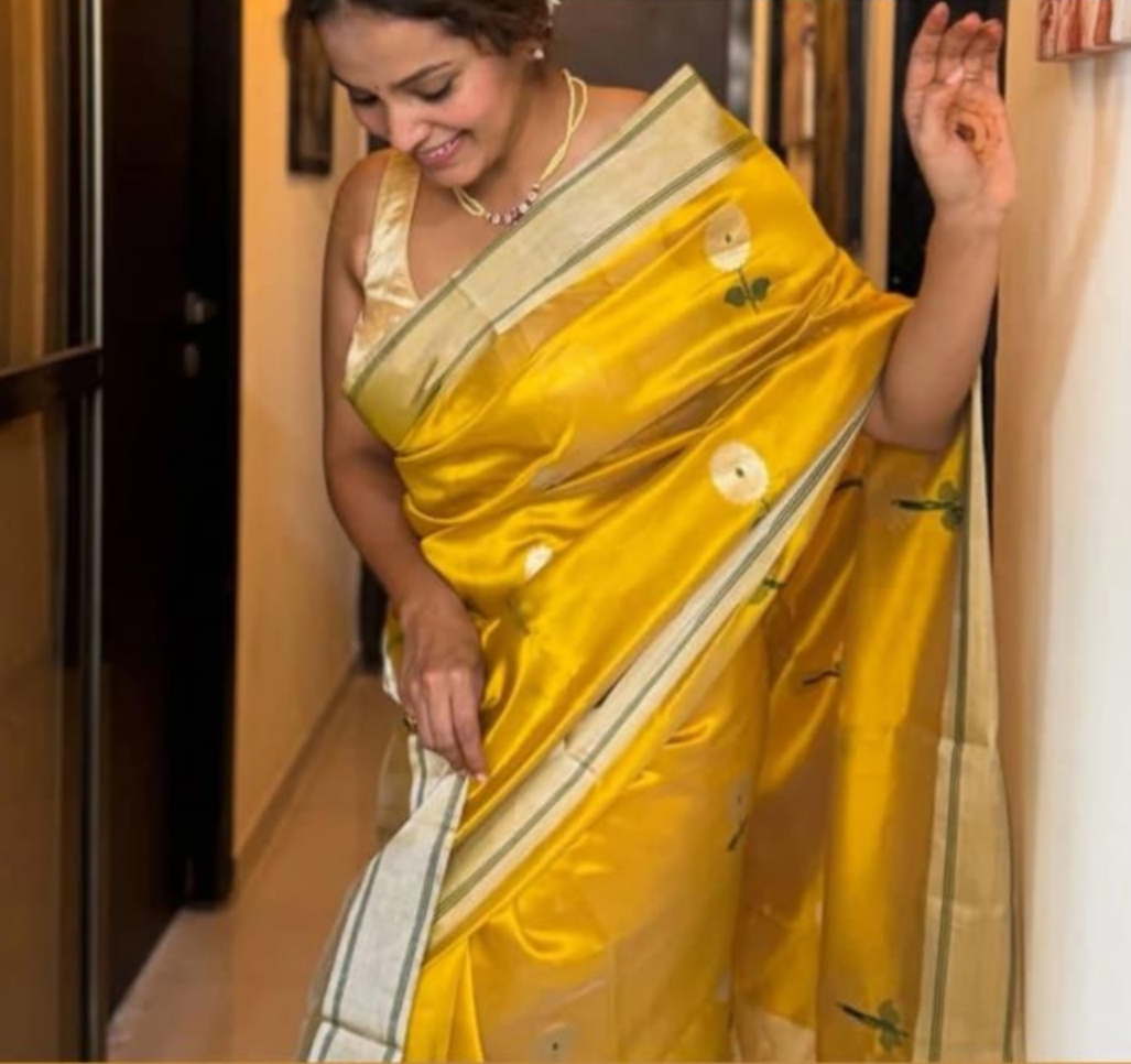 Model in Radiant Yellow Chanderi Pattu Handloom Saree for a wedding Mehendi look