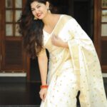 An Indian model in a Small Polks Kerala Kassavu Saree