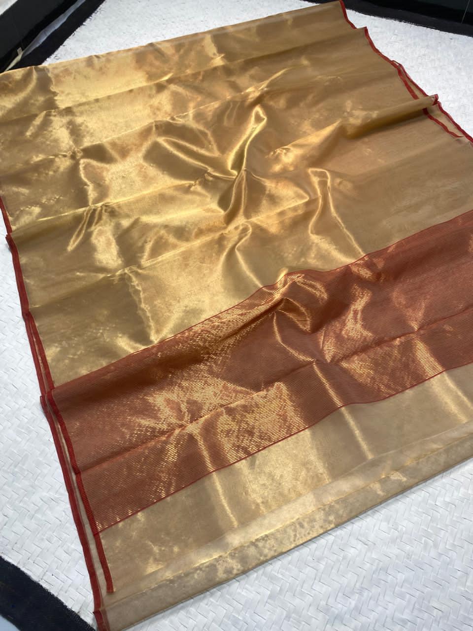 A full-drape view of the Antique Gold Chanderi Tissue Silk saree at SareePlus Gallery, showcasing its elegant sheen and contrast red pallu.